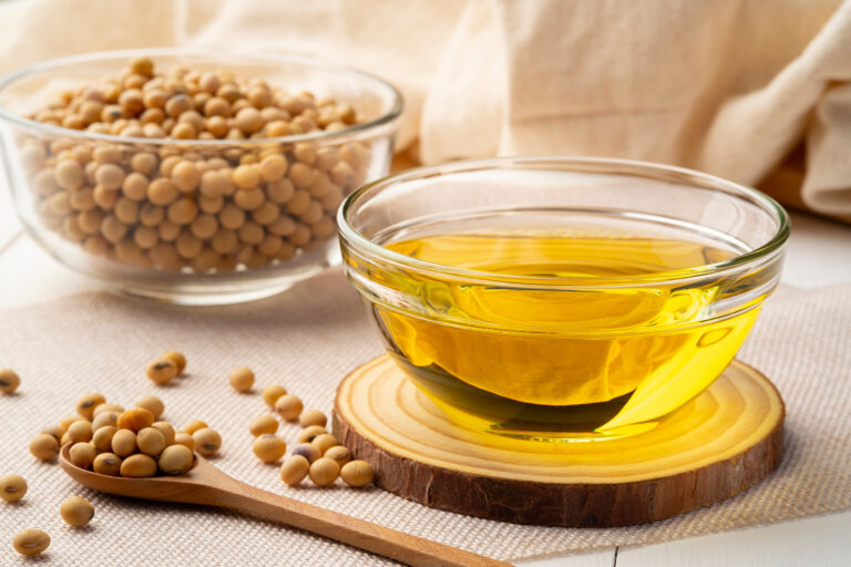 Soybeans and soybean oil in a bowl.