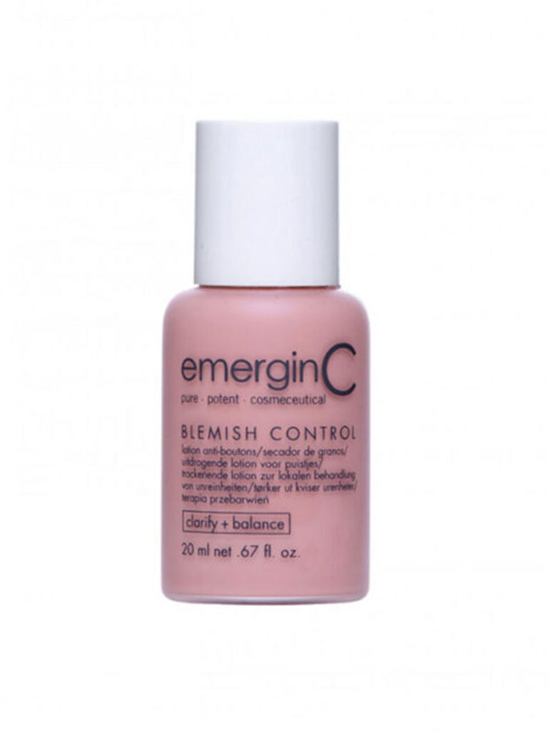 A small pink bottle of emerginC tinted blemish control lotion with a white cap, labeled “clarity + balance,” 20 ml (0.67 fl. oz.).