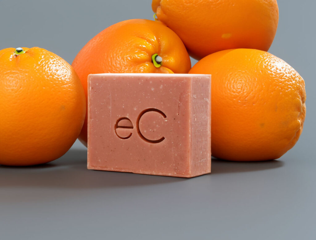 A Signature Facial Bar with an "ec" imprint surrounded by fresh oranges on a grey background, suggesting a citrus-scented cleansing product.