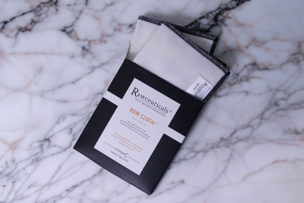 A RAW CLOTH™ pouch placed on a marble surface.