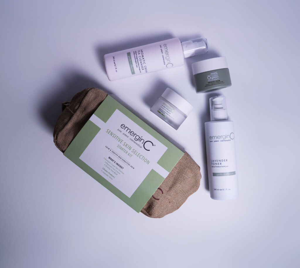 A neatly arranged selection of the EmerginC Sensitive Skin Collection Starter Kit, presented on a clean, uniform background.