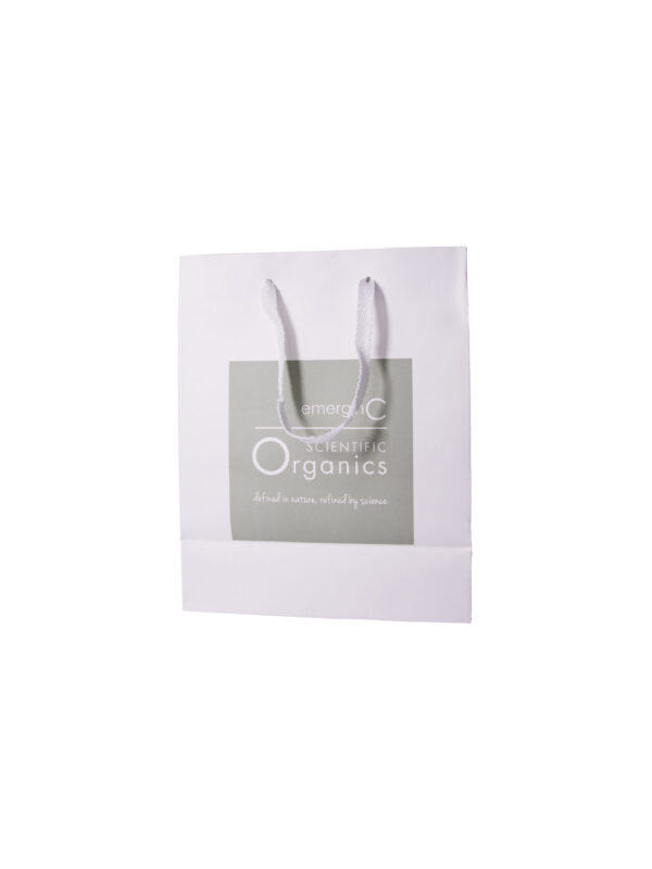 White scientific organics retail bag with the logo "emerginc scientific organics" printed in the center, emphasizing a blend of nature and science in their products.