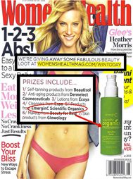 Cover of Women’s Health magazine featuring a smiling blonde woman in a yellow top. A highlighted box promotes a beauty giveaway with award-winning skin care brands, displaying a green bottle of EmerginC Scientific Organics product.