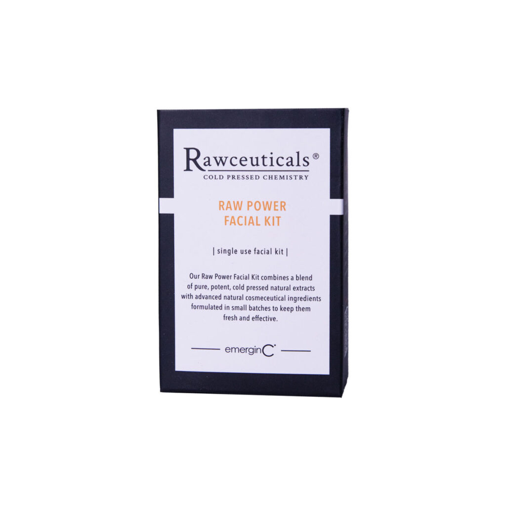 A box of Raw Power Facial Kit by emerginC, with a white label featuring black and orange text, offers a blend of pure, potent, cold-pressed natural extracts specially formulated for facial care.